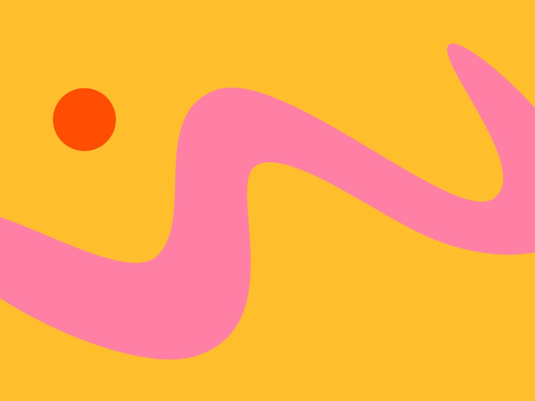 Pink wavy line and orange dot on yellow background.