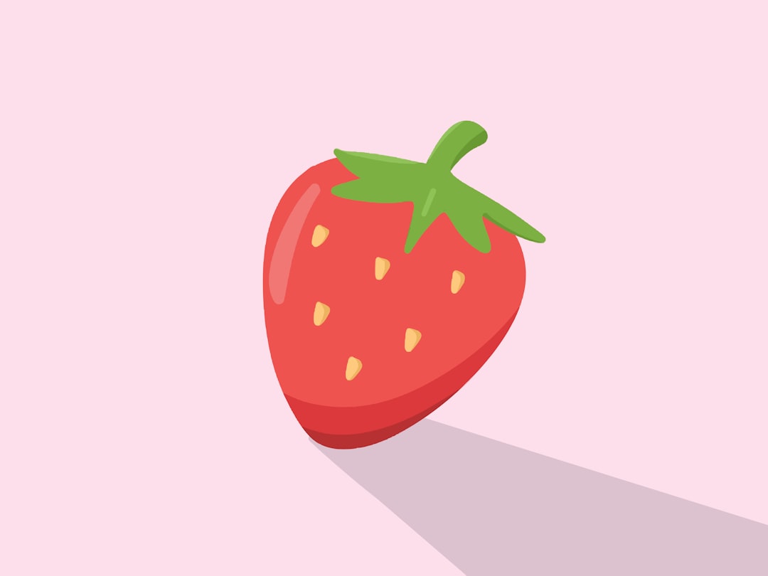 A single red strawberry with a green stem and shadow.