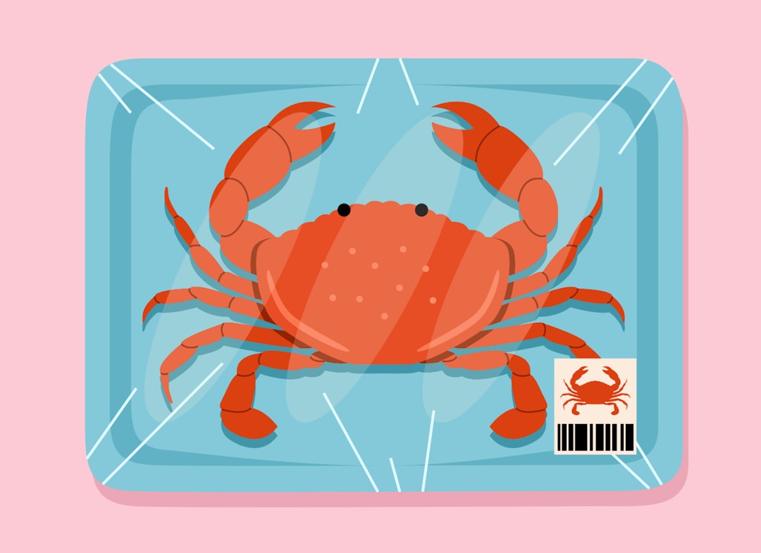 A whole crab packaged in plastic wrap